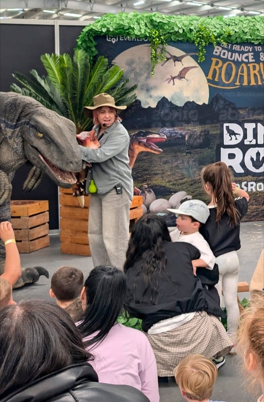 Roving life-sized dinosaur at DinosRoar party